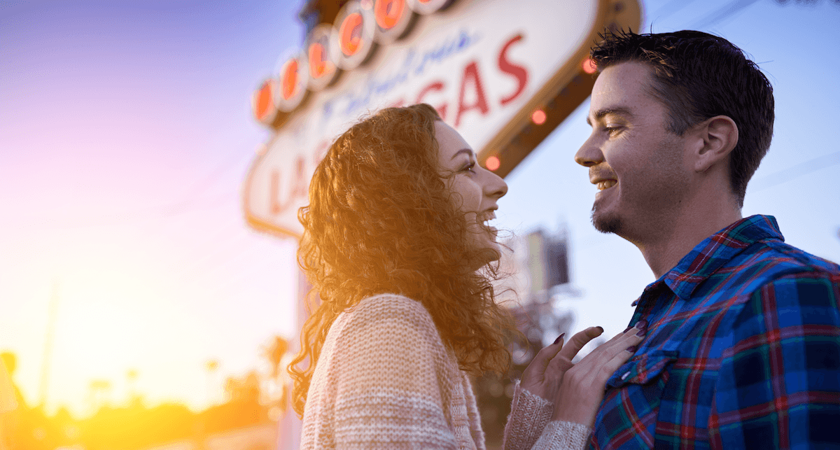 Couple in front of The Las Vegas Sign